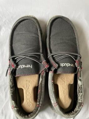 Hey Dude Men's Slip-On Loafers in Black with Red Accents